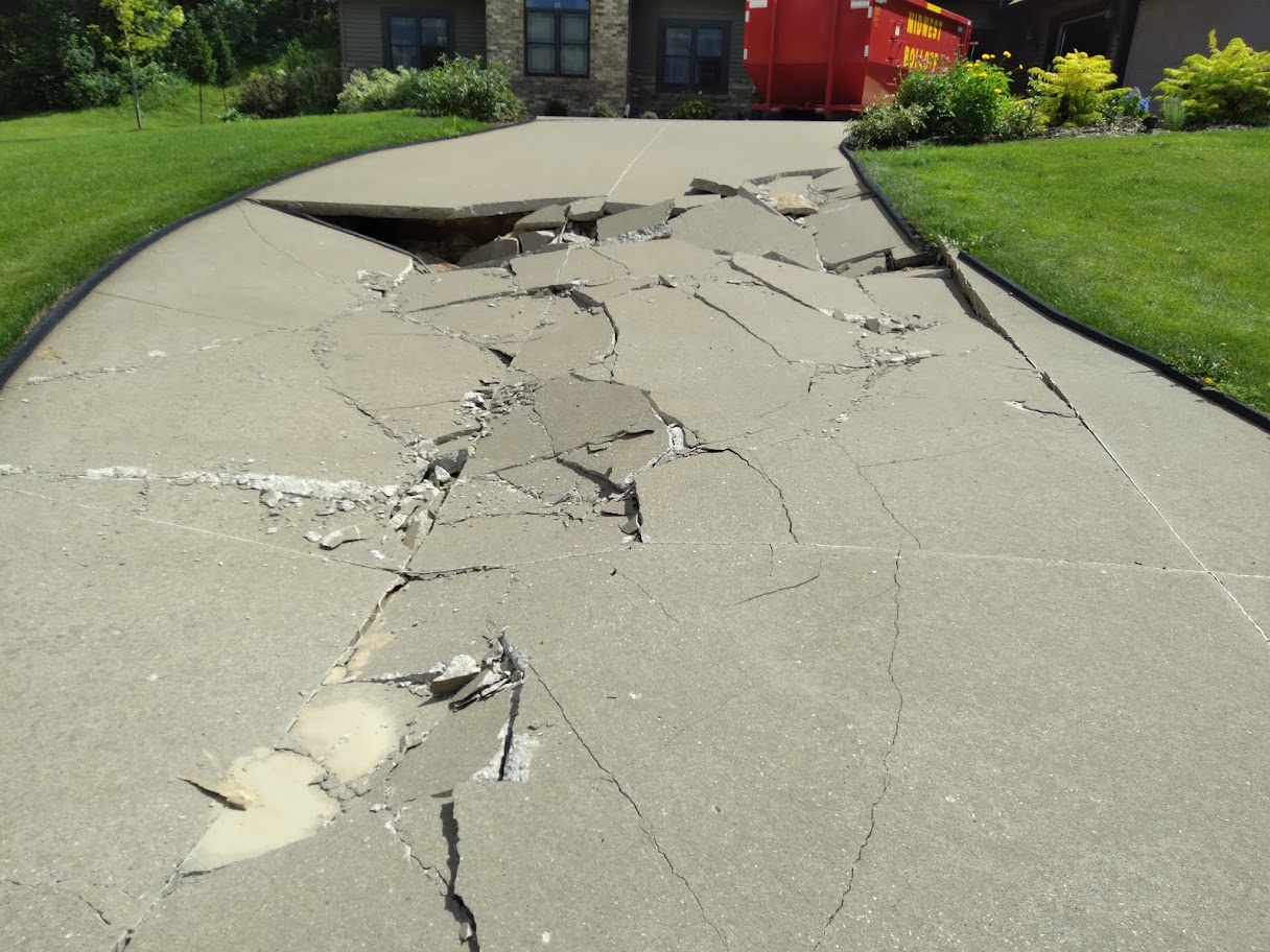 Extreme case of Concrete driveway collapsing