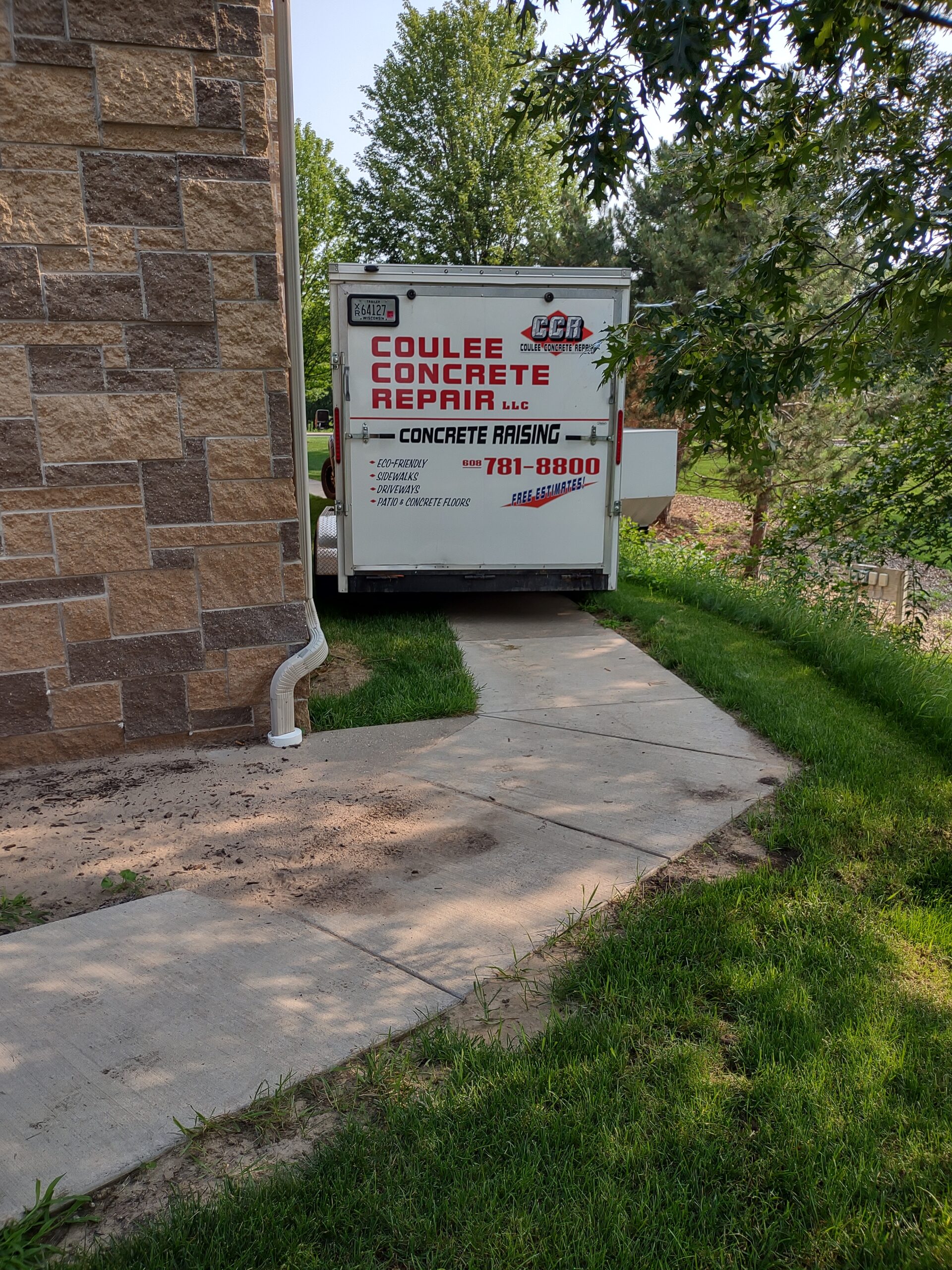 Coulee Concrete Repair trailer staged at property repair site